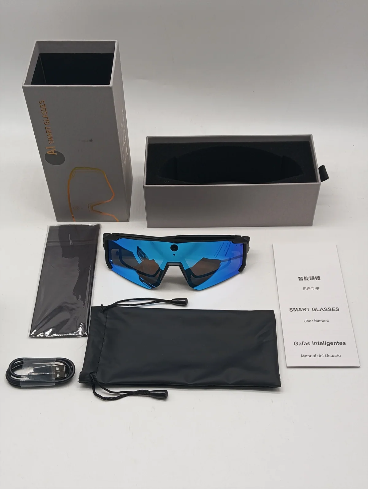 V06 smart glasses packaging example with product accessories